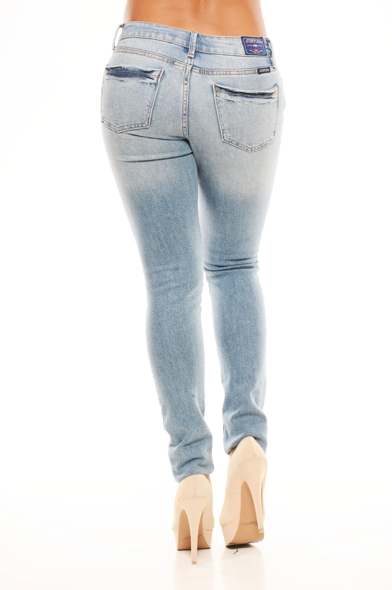 Low Rise Distressed Skinnies - Light Denim